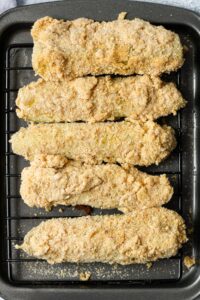 coated pickles with flour and breadcrumbs mixture