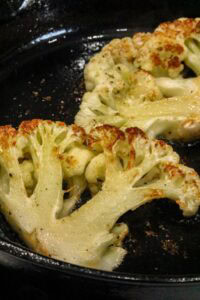 pan fried cauliflower steaks in cast iron skillet