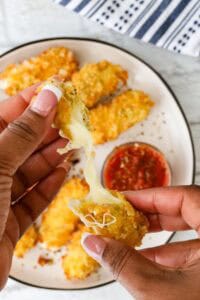 Fried Mozzarella Sticks pulled apart
