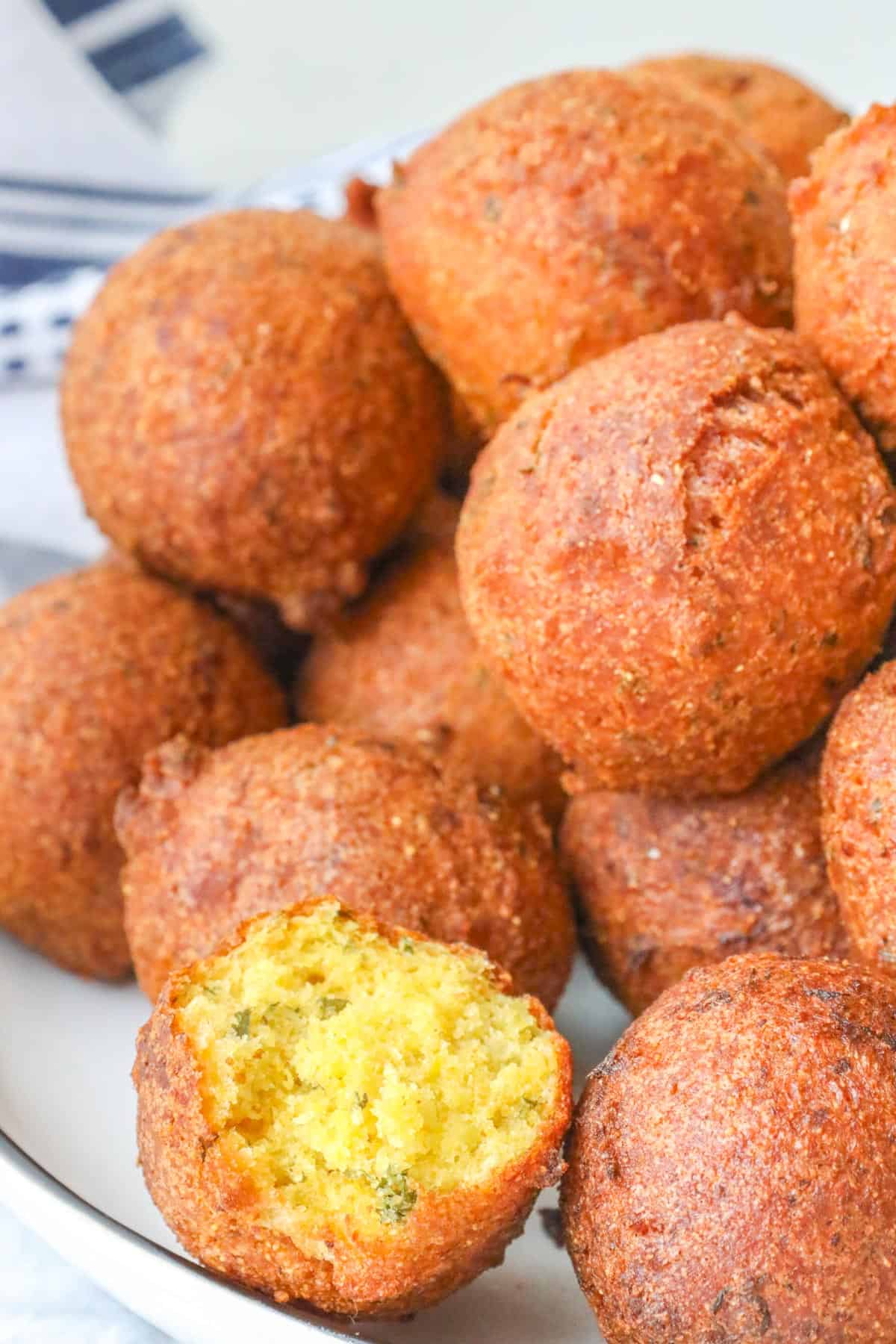 Hush Puppies Recipe with stacked and one open