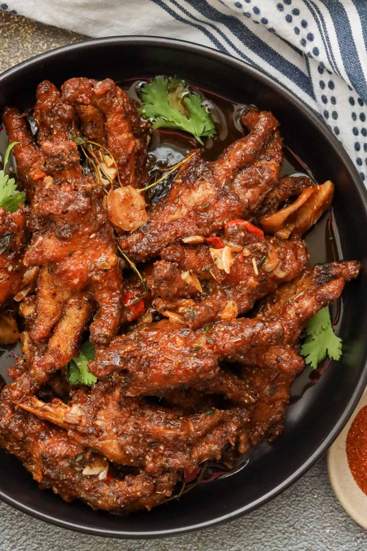 How to Make Fried Chicken Feet with Garlic & Heat on black plate