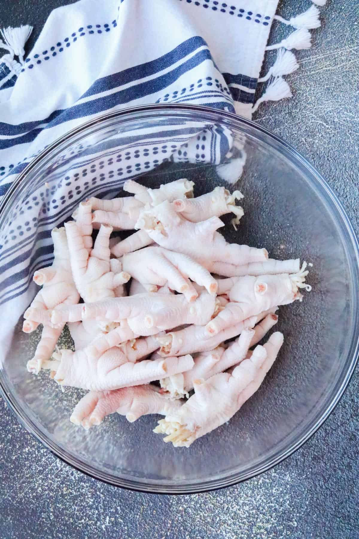 Chicken feet in clear bowl