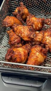 Fried Chicken Wings in frying basket