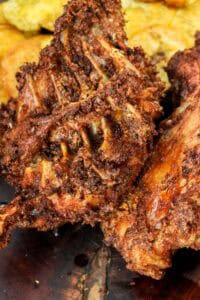 crispy turkey backs on wooden board