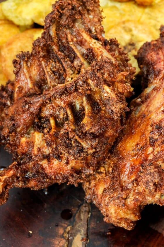 crispy turkey backs on wooden board
