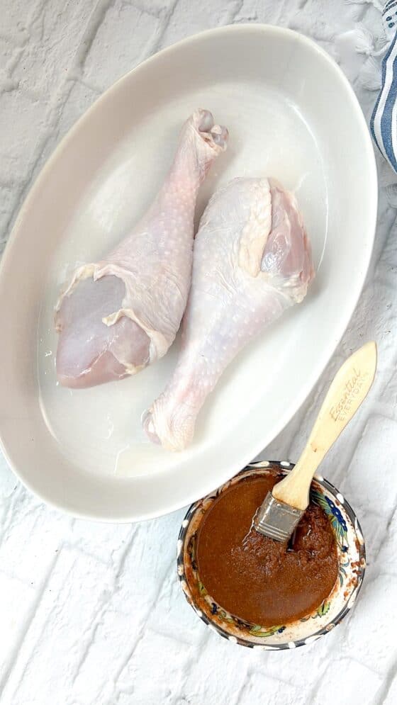 turkey legs I dish with season in a bowl
