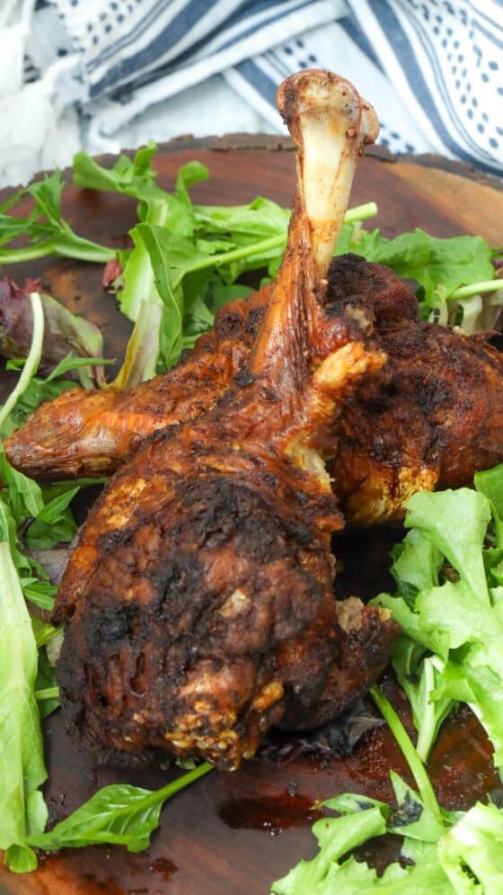 fried turkey legs on wooden board