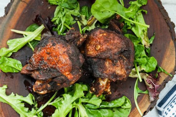 FRIED TURKEY THIGHS ON WOODEN BOARD