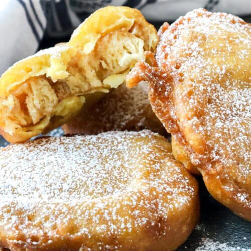 3 fried honey buns stacked on top of each other