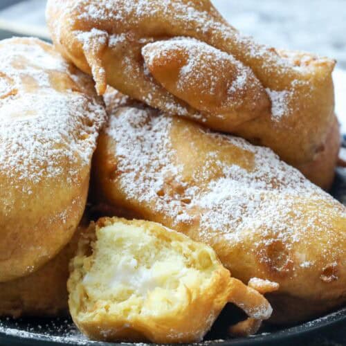 Fried Twinkies dusted with powdered sugar