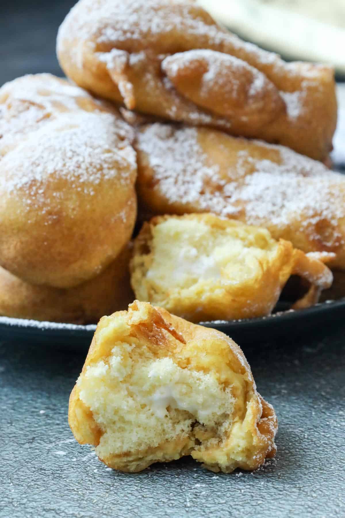 fried twinkies stacked on top of each other. 