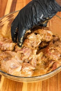 hand seasoning air fryer steak bites