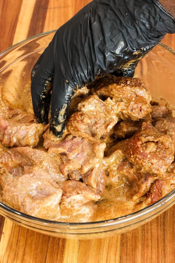hand seasoning air fryer steak bites