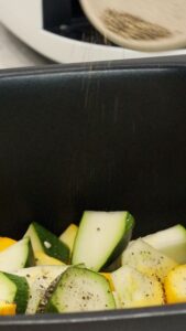 Seasoning air fryer zucchini and squash