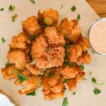 Deep Fried Copycat Bloomin Onion with dipping sauce