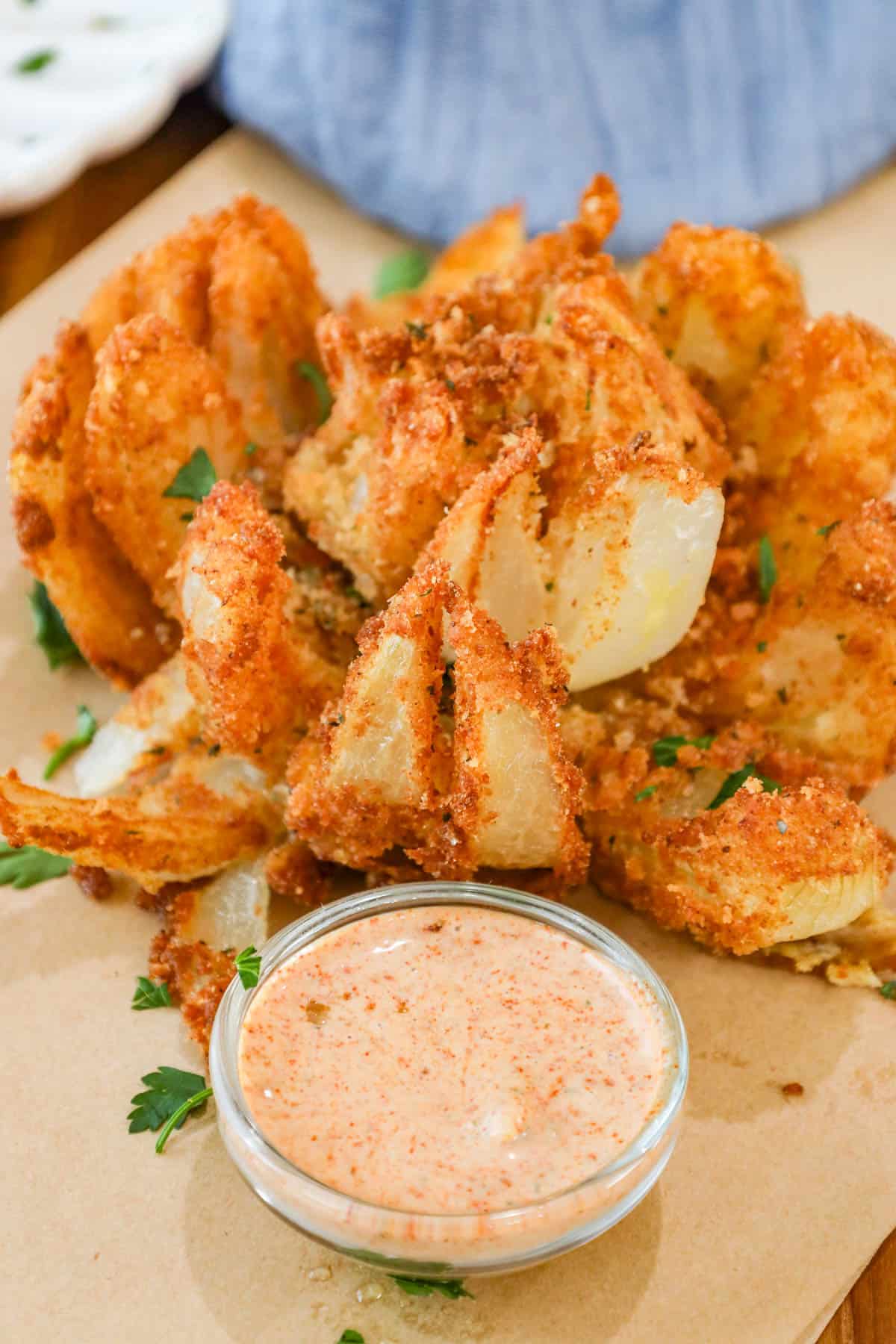 Deep Fried Copycat Bloomin Onion with dipping sauce