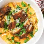 Delicious Gochujang Chicken Breast Recipe over a bed of gochujang pasta