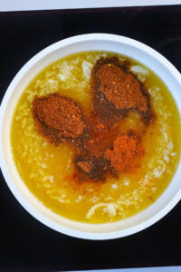 adding ingredients to make chipotle sauce