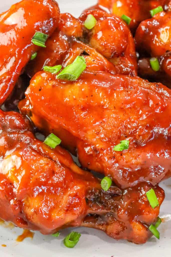 homemade fried bbq chicken wings topped with chives